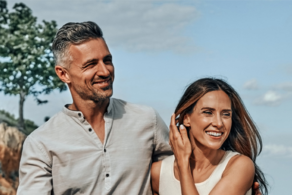 Alpha-Lipoic-Acid-IV-Therapy-Clinic-2 A healthy, happy middle-aged couple under the sky. Get Alpha Lipoic Acid IV Therapy from Guerda Johnson, FNP-C in Tyler East Texas Area.