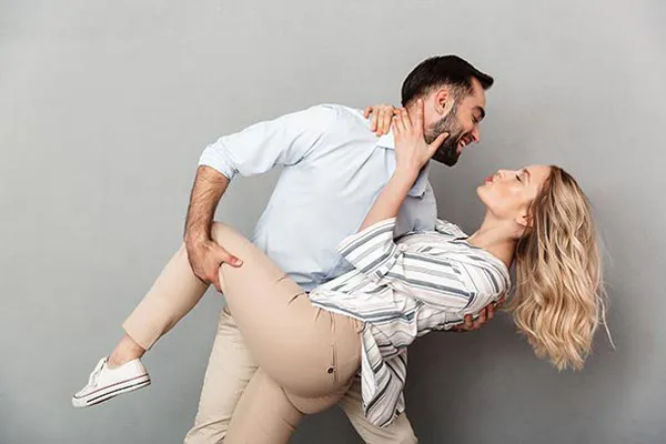 Erectile-Dysfunction-Medications-Clinic A couple dancing and performing a dip. Schedule medications for erectile dysfunction from Guerda Johnson, FNP-C in Tyler East Texas Area.