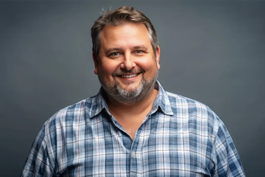 High-Cholesterol-Clinic A happy, slightly overweight man with a beard. Get treatment for high cholesterol from Guerda Johnson, FNP-C in Tyler East Texas Area.