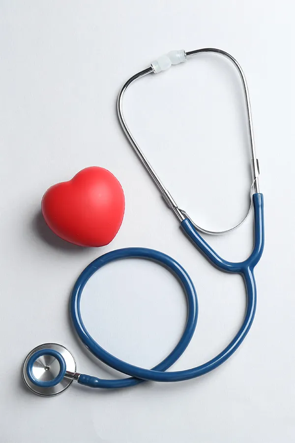 Hypertension-Treatment A toy heart and a stethoscope. Get hypertension treatment from Guerda Johnson, FNP-C in Tyler East Texas Area.