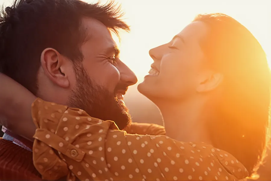 Lipo-MIC-Injections-Clinic A happy couple embrace in the sunset. Schedule Lipo-MIC vitamin injection treatment from Guerda Johnson, FNP-C in Tyler East Texas Area.